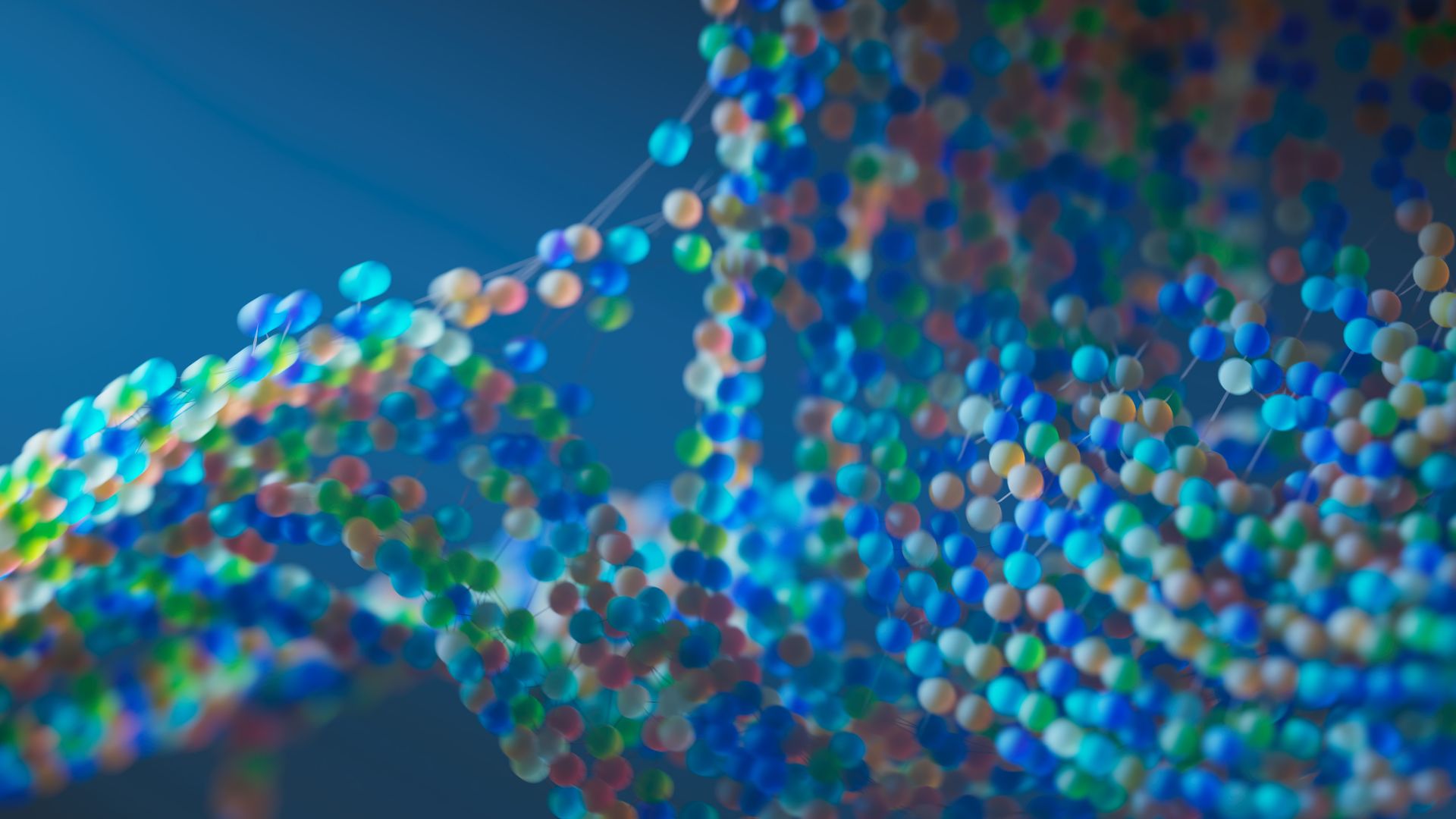 Abstract DNA helix rendered as coloured particles